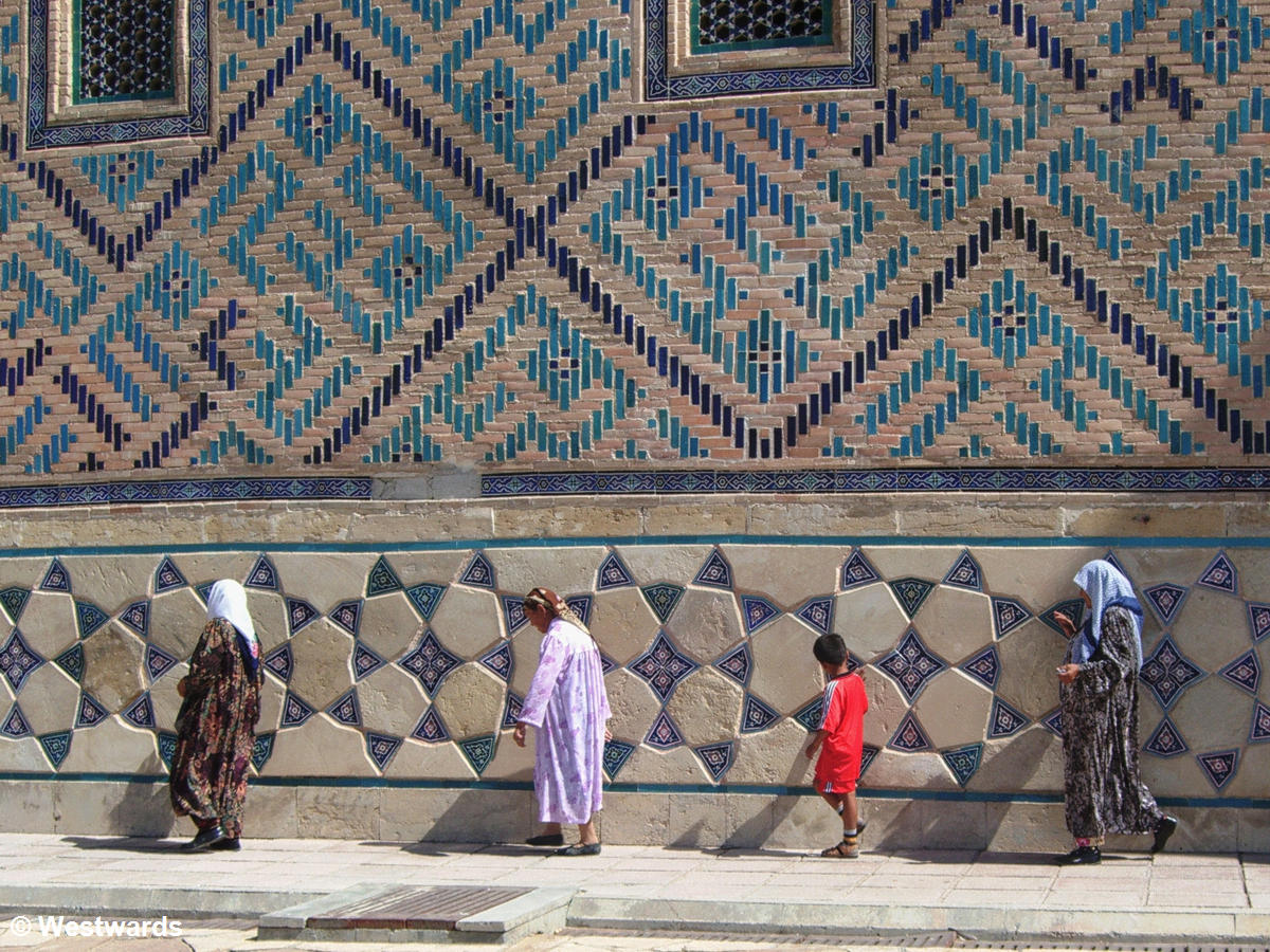 Pilgrims walking around the the Mausoleum of Ahmed Yassawi, one of the most important muslim sites in Central Asia