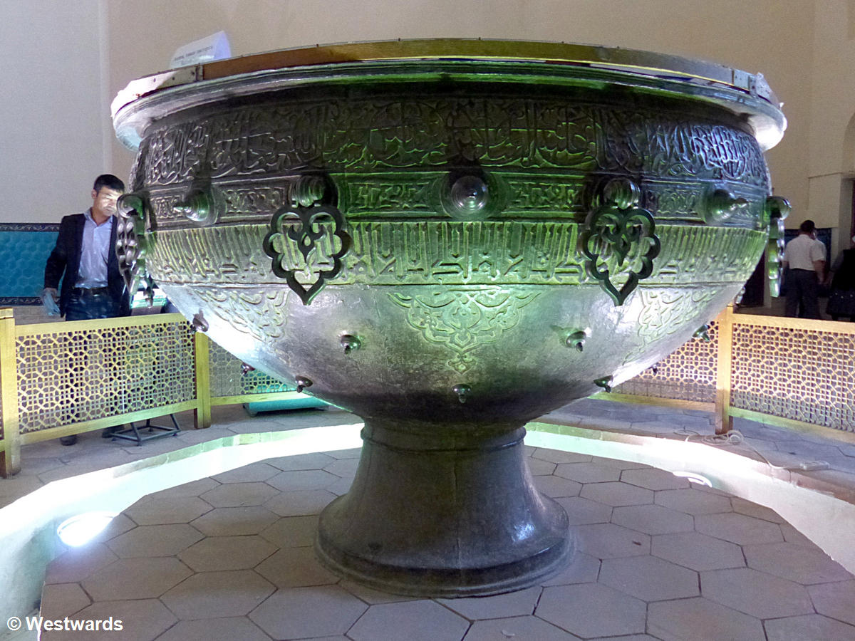 A large bronze water bassin in the TURKISTAN ACHMED YASSAWI MAUSOLEUM 