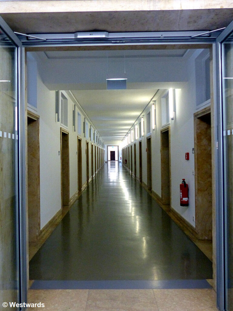 wide corridor with many doors