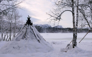Sami tent in snowy landscape in Alta