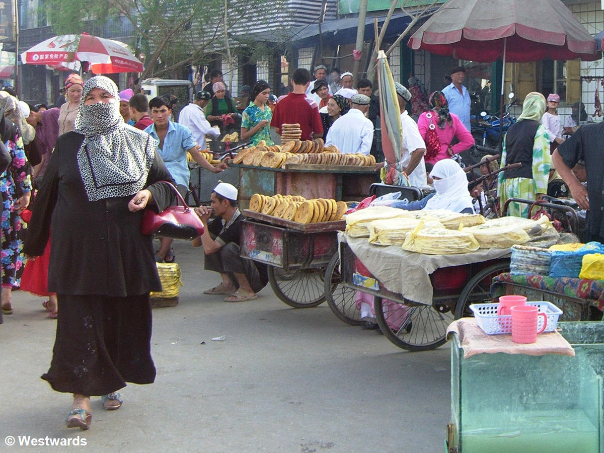 Uighurs on the market in Hotan