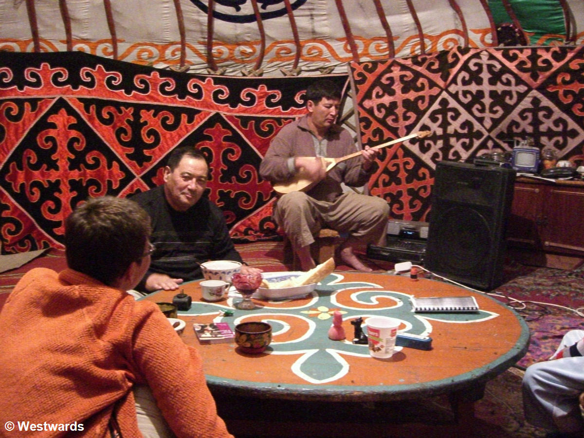 Traditional food and music in a yurt in Korgalzhyn