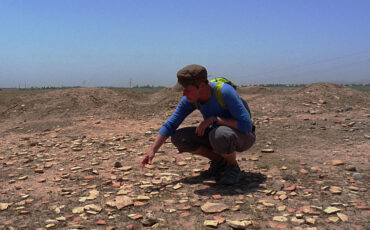 Isa inspecting some pottery chards at Jarqotan