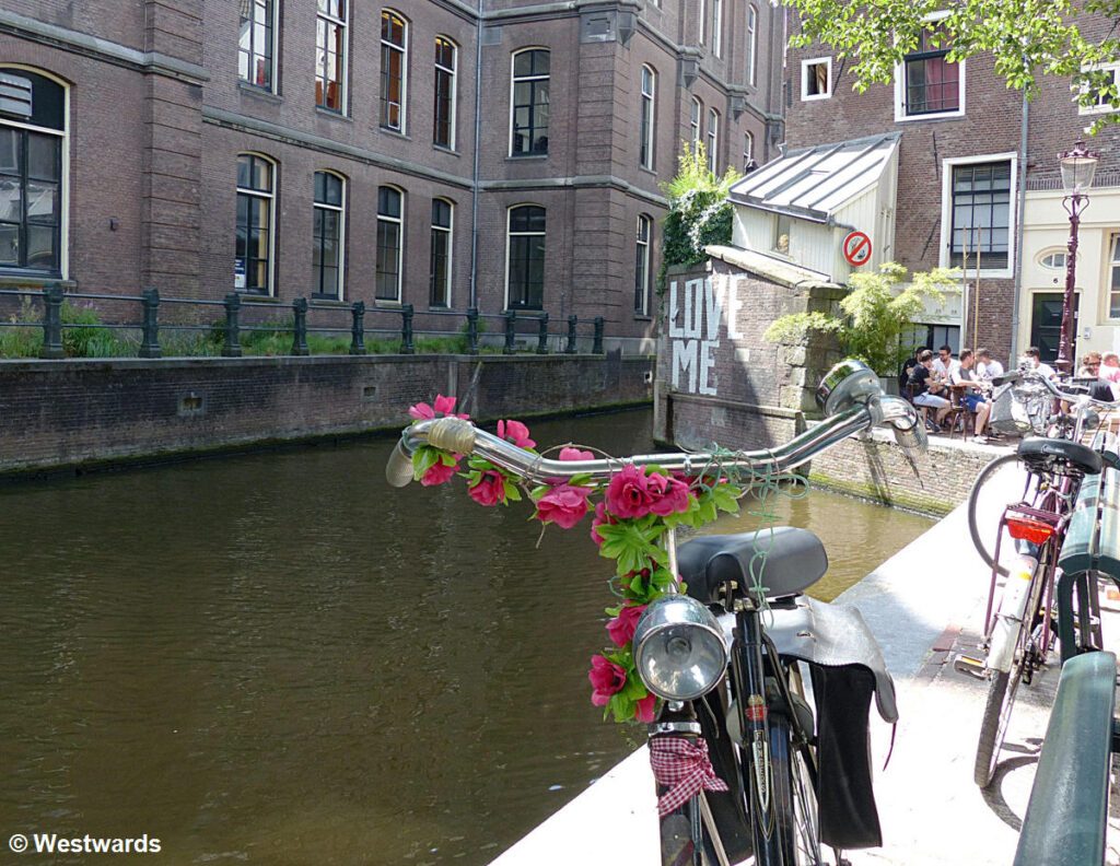 Bicycle in front of an Amsterdam town canal