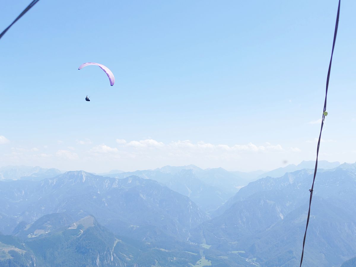 Paraglider high above the Gesaeuse mountains, Austria