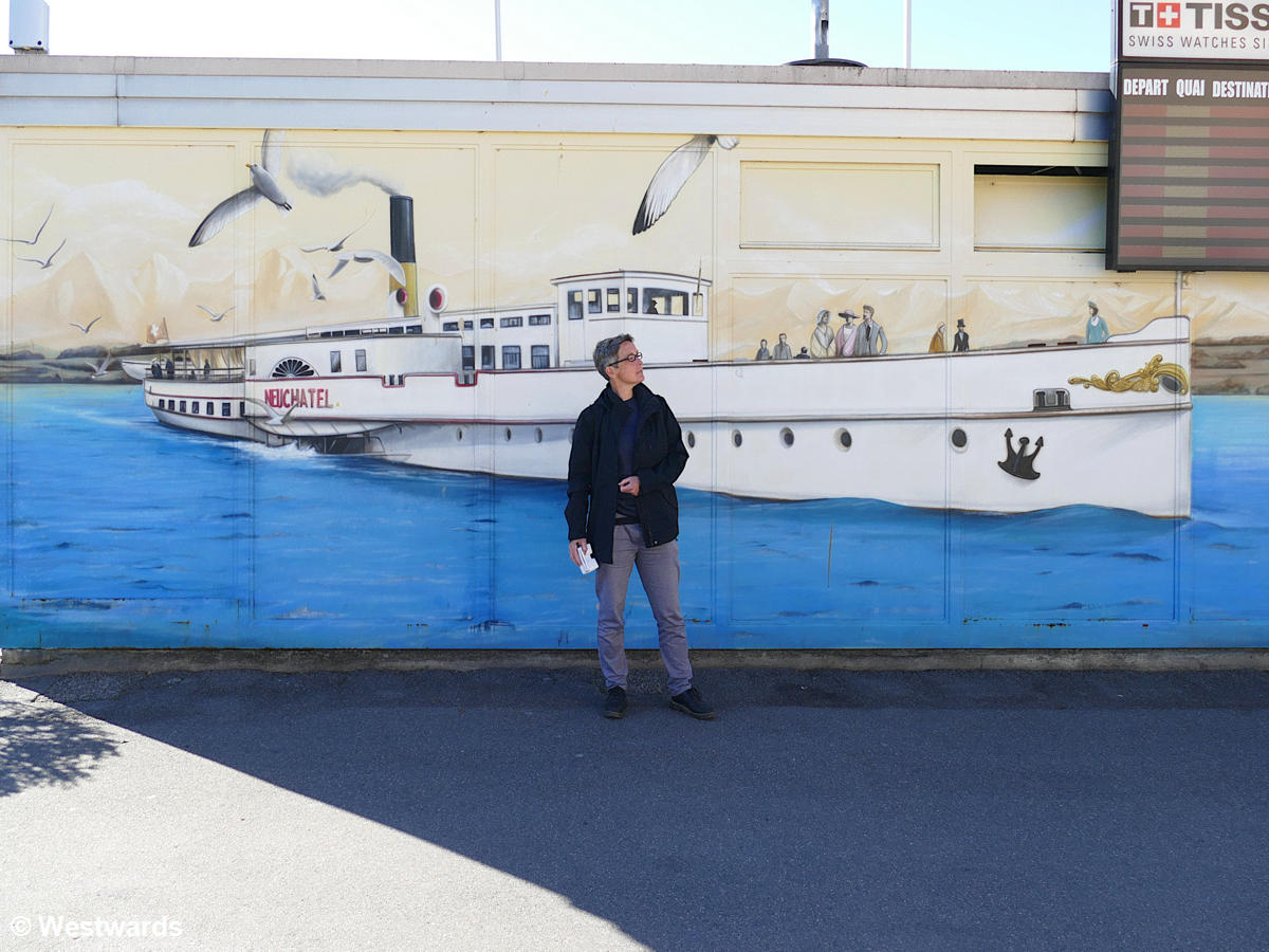 Isa with a steamer mural, on our Neuchatel Belle Epoque walk