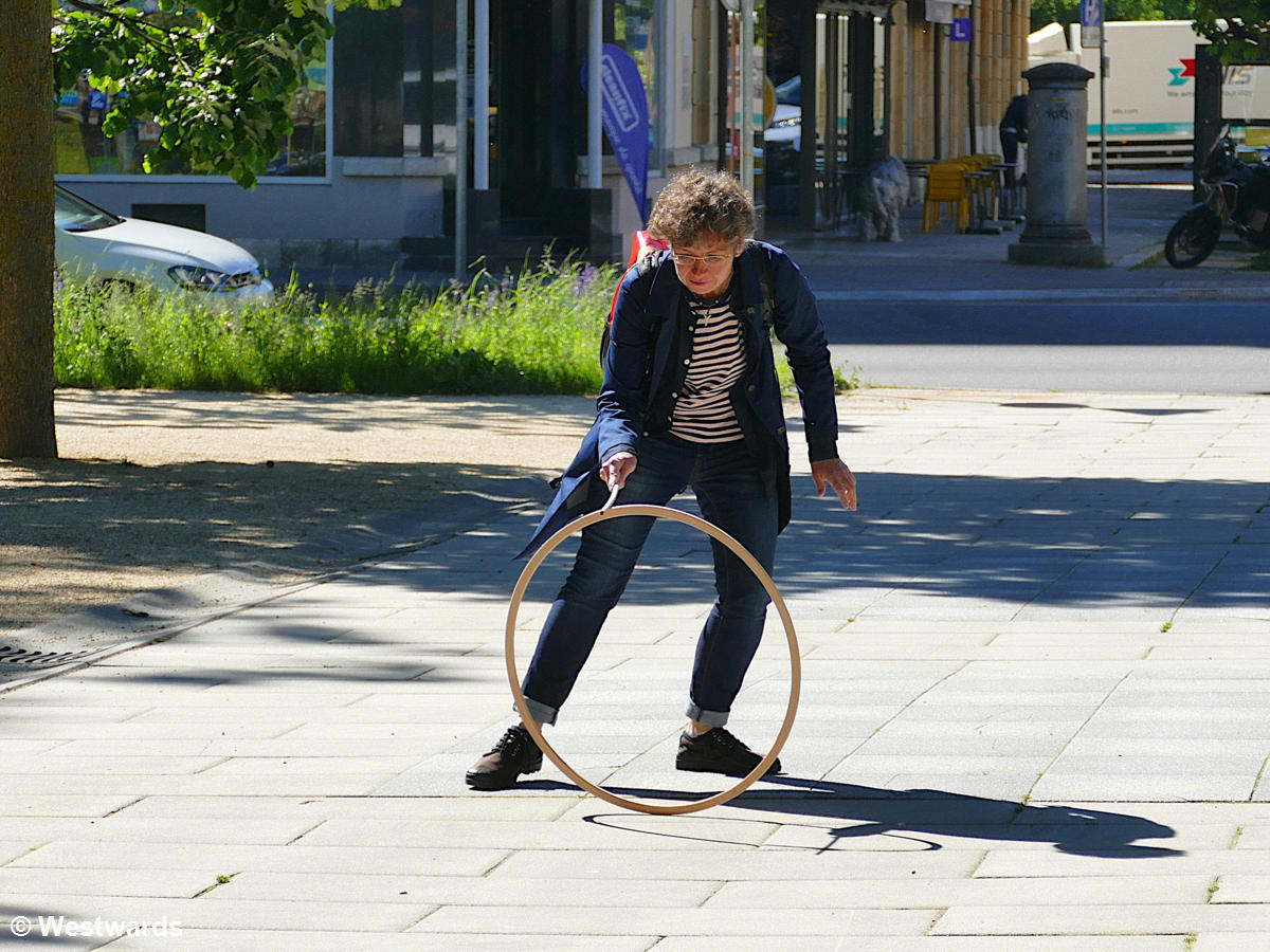 Natascha trying a Belle Epoque hoop game in Neuchatel