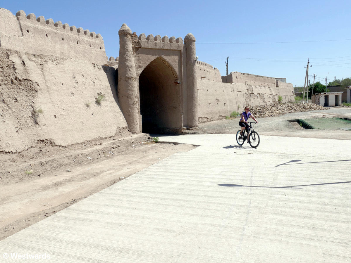 Cycling along Khiva's outer city wall