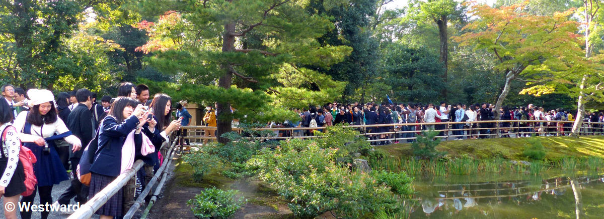 Massive numbers of visitors at the Kinkakuji in Kyoto - one of the top UNESCO sites in Japan