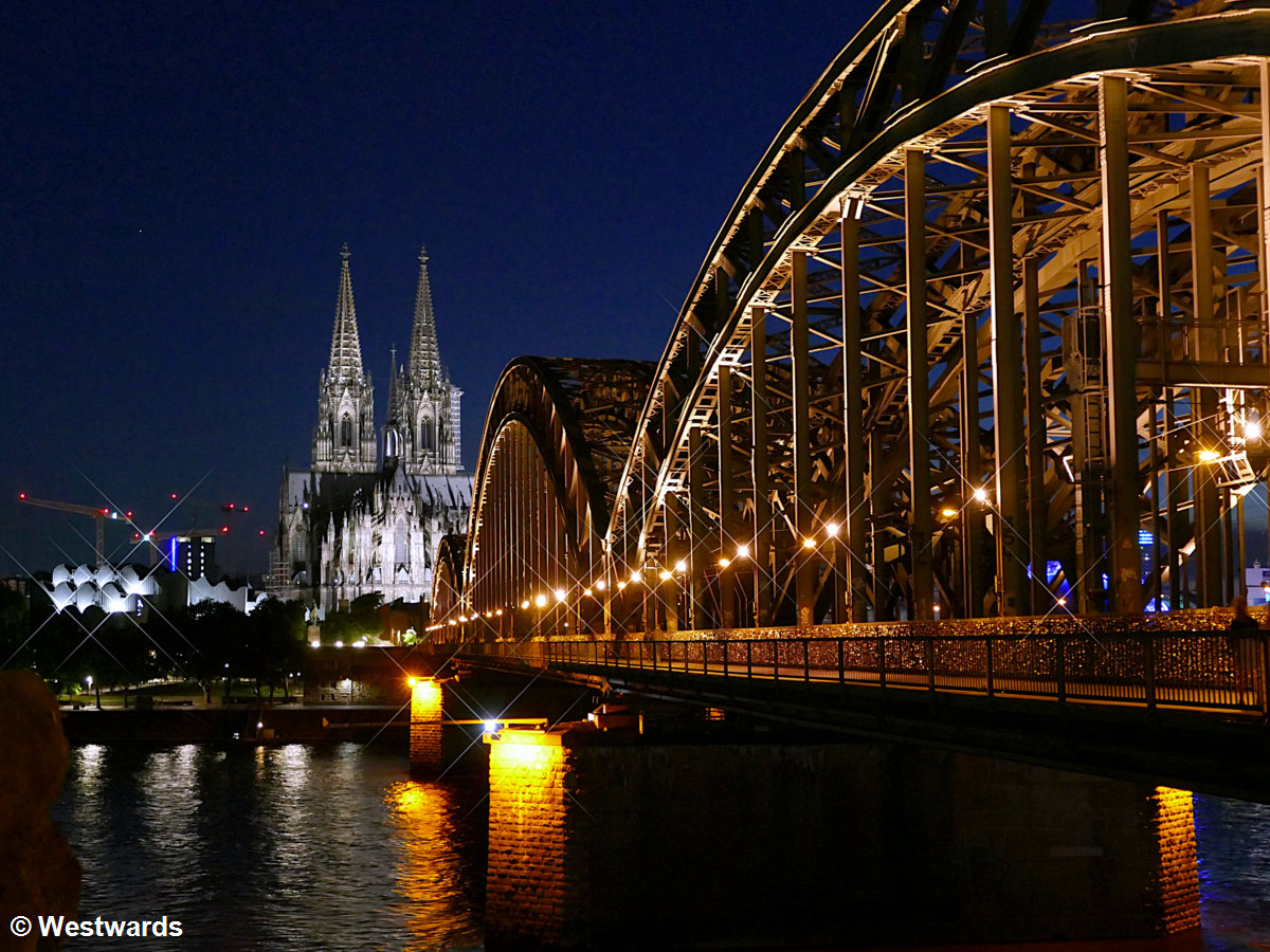Classic view of Cologne Cathedral with the River Rhine and the train bridge, Hohenzollernbrücke