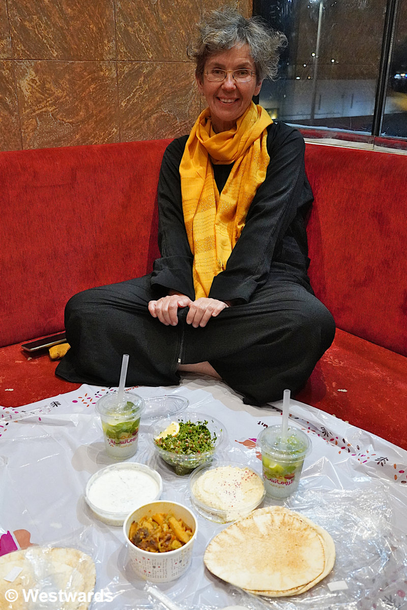 Saudi dining our tiny compartment at Romansia restaurant in Madinah