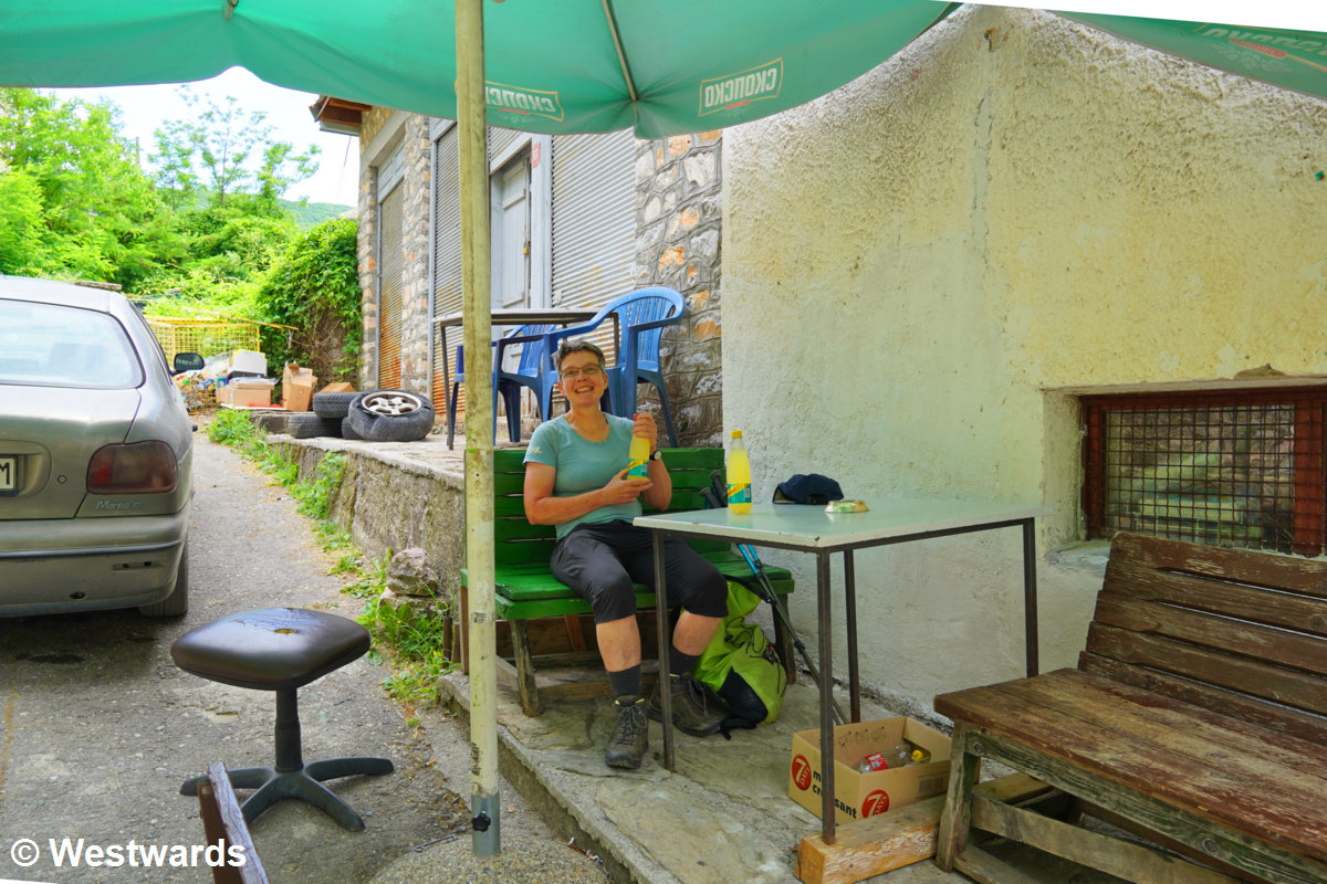 Enjoying a break from hiking in the only shop in Galicnik